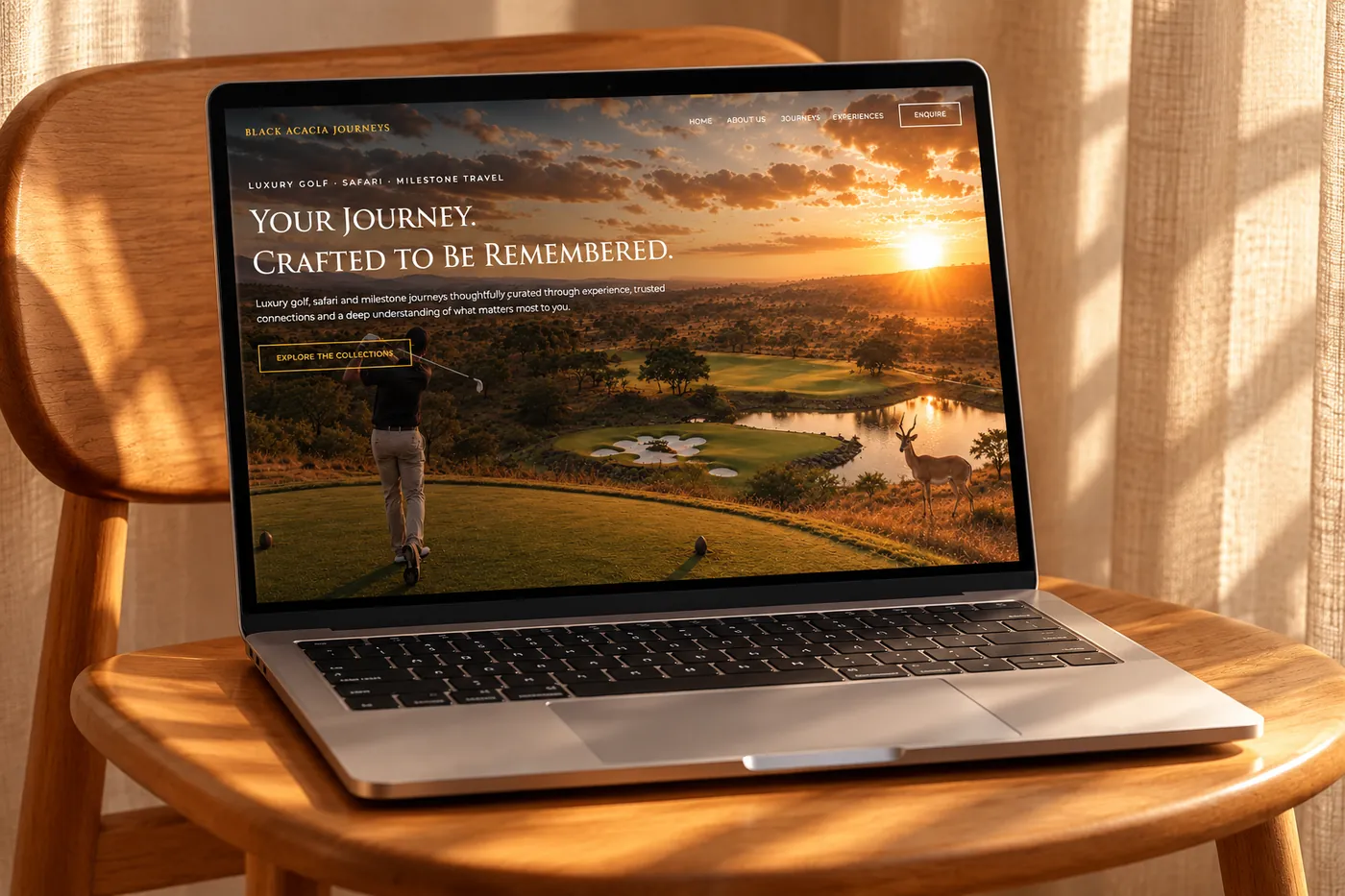 The Black Acacia Journeys website on a laptop