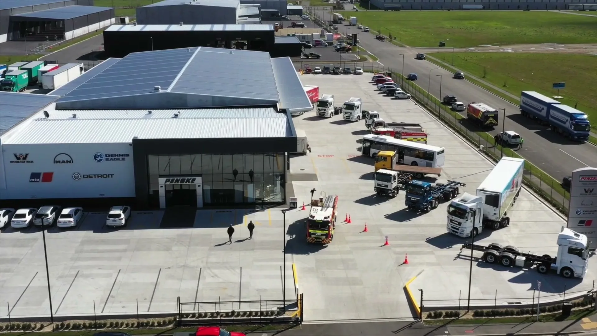 An aerial view of a Penske site with trucks
