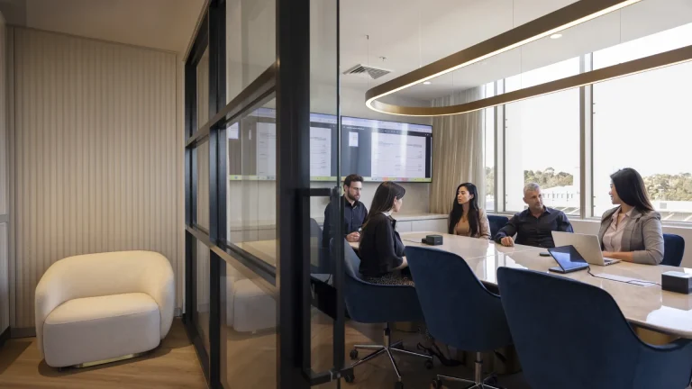 The SOCM team in a meeting room