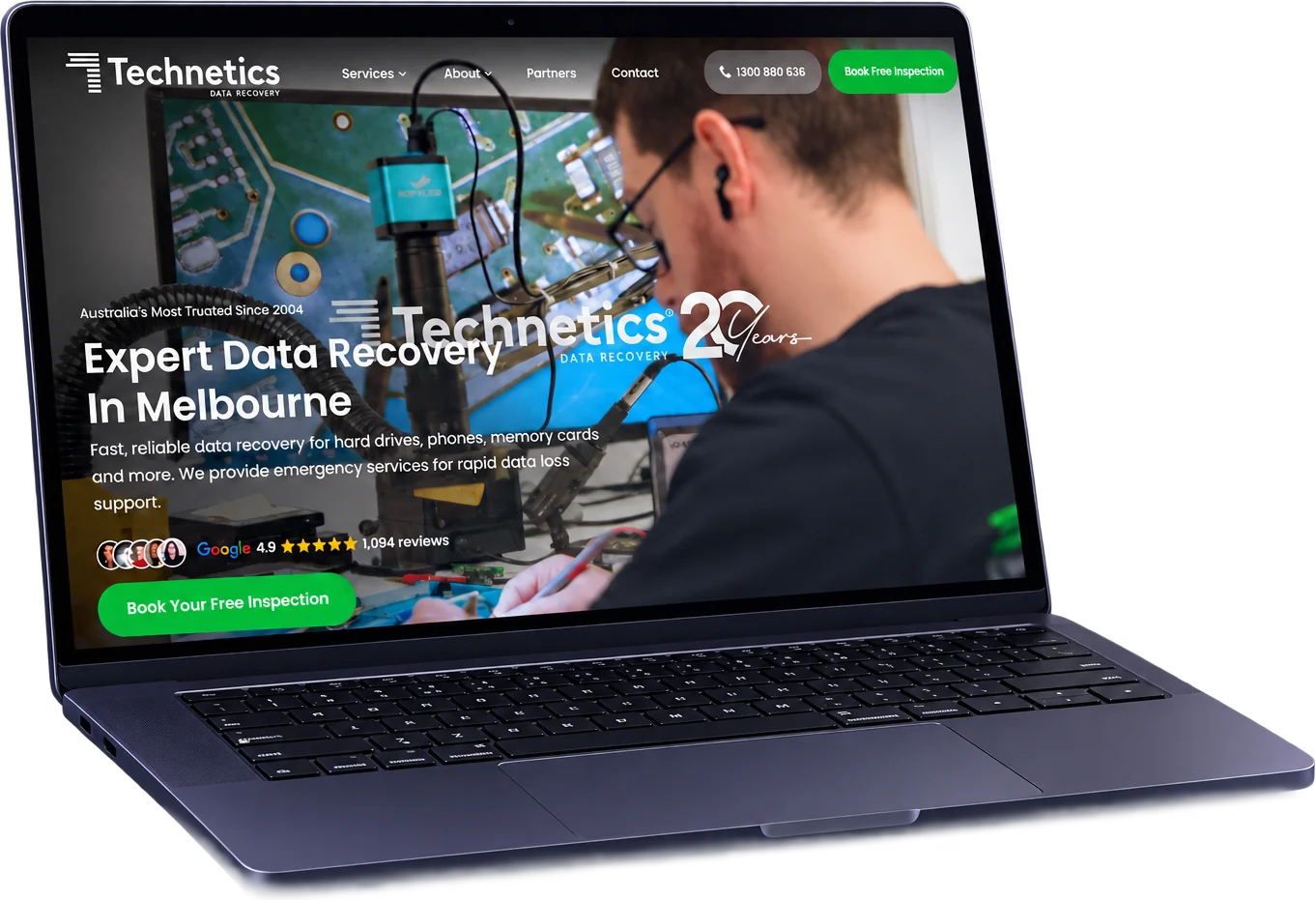 The Technetics Data Recovery website on a laptop