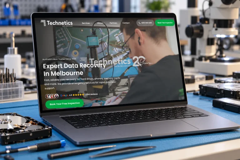 The Technetics Data Recovery website on a laptop